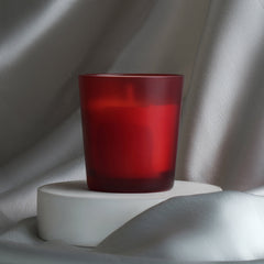 Candle in red glass