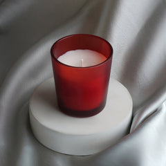 Candle in red glass